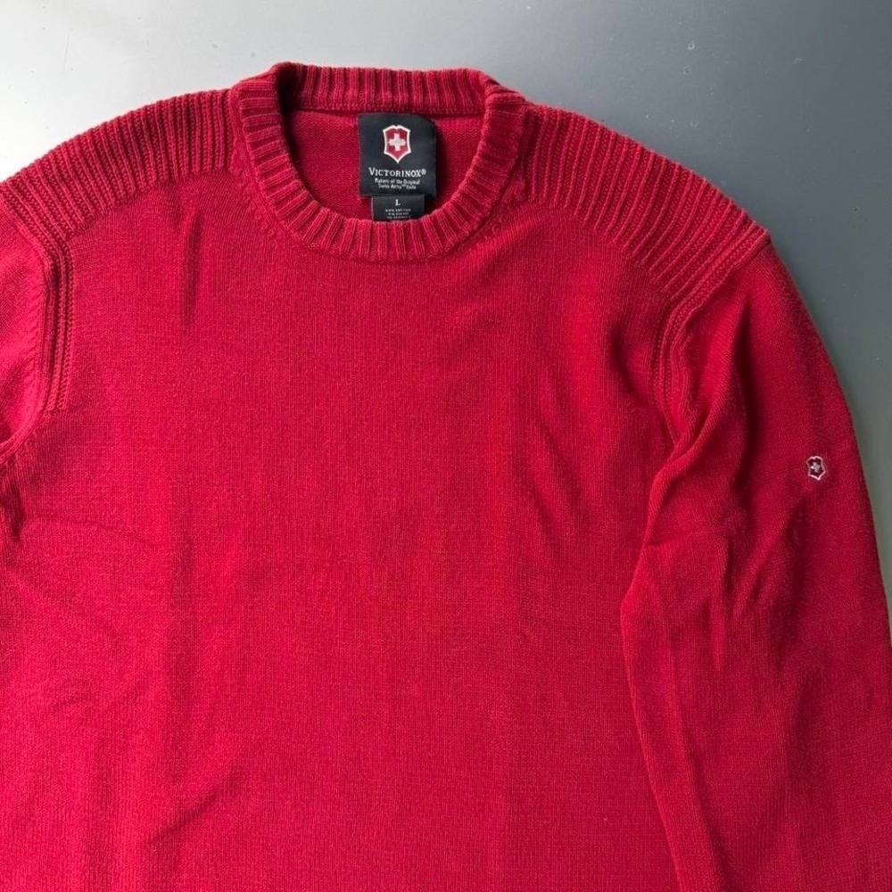 Red heavyweight Victorinox sweater maker of the Swiss Army Knife